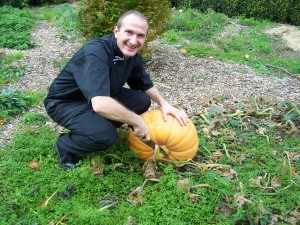 Stuart - One of Artizian's managers with his prized  site-grown pumpkin